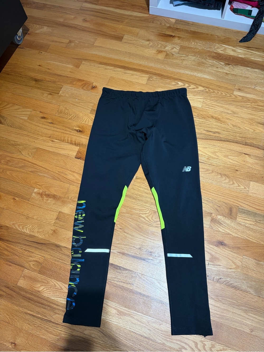 New Balance men’s Black Athletic Tights with Neon Accent